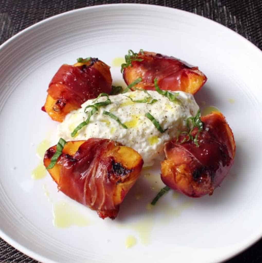 Grilled Prosciutto-Wrapped Peaches with Burrata & Basil