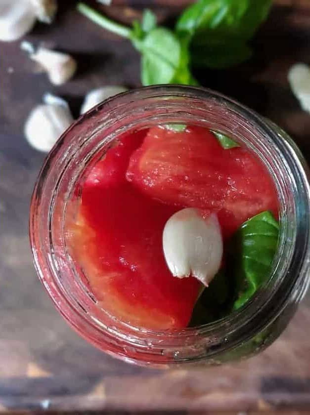 Canning Whole Tomatoes with Basil and Garlic