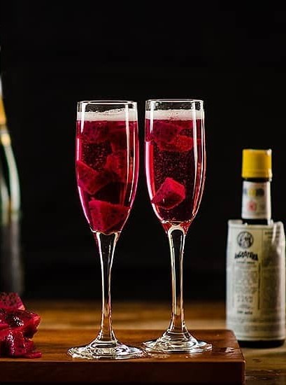 Classic Champagne Cocktail With a Tropical Fruit Twist