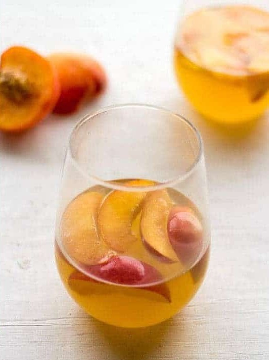 White Wine Cocktail With Peaches and Honey Fig Syrup