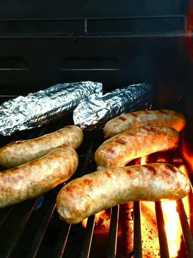 Beer Brats with Cheese Sauce and Caramelized Onions